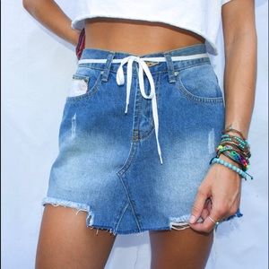 hand stitched denim mini skirt w/ pocket detailing